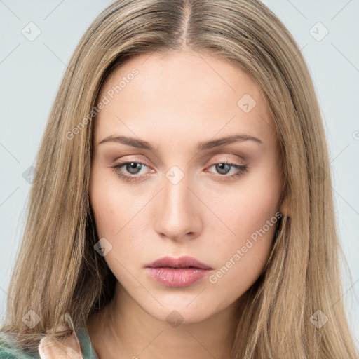 Neutral white young-adult female with long  brown hair and green eyes