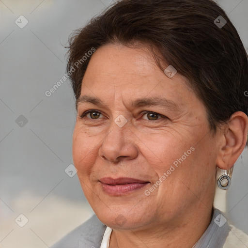 Joyful white adult female with short  brown hair and brown eyes