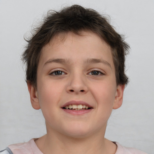 Joyful white child female with short  brown hair and brown eyes