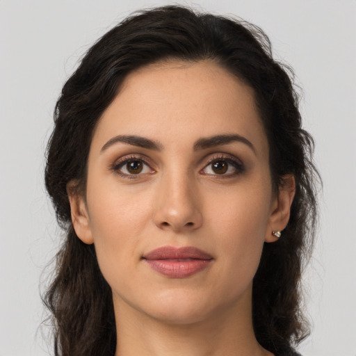 Neutral latino young-adult female with long  brown hair and brown eyes
