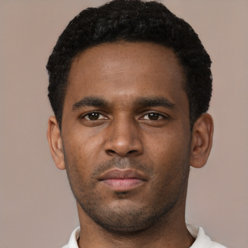Neutral black young-adult male with short  black hair and brown eyes