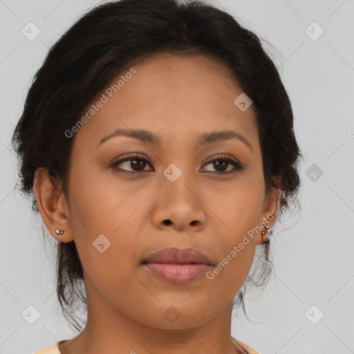 Joyful latino young-adult female with long  brown hair and brown eyes