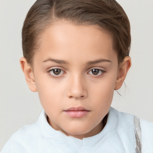 Neutral white child female with short  brown hair and brown eyes