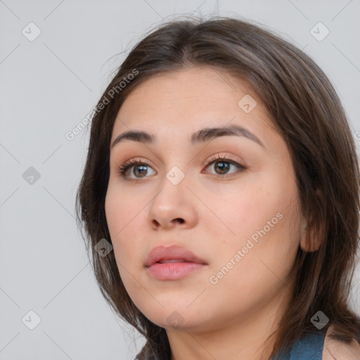 Neutral white young-adult female with medium  brown hair and brown eyes