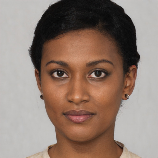 Neutral black young-adult female with short  black hair and brown eyes