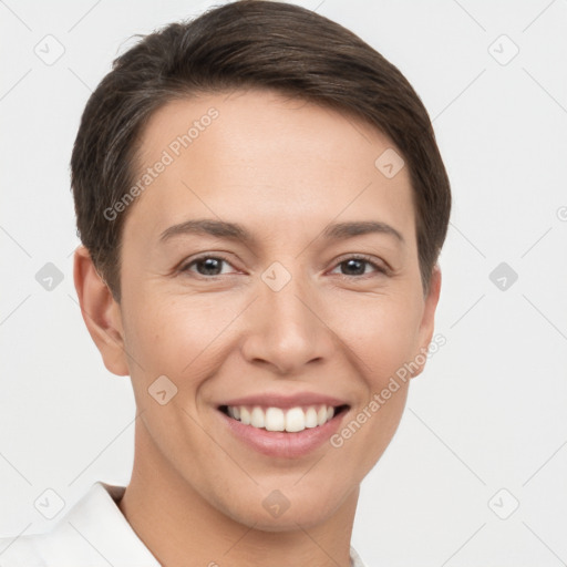 Joyful white young-adult female with short  brown hair and brown eyes