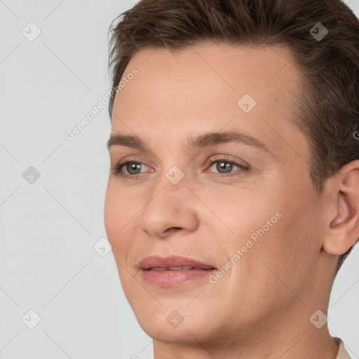 Joyful white young-adult female with short  brown hair and brown eyes