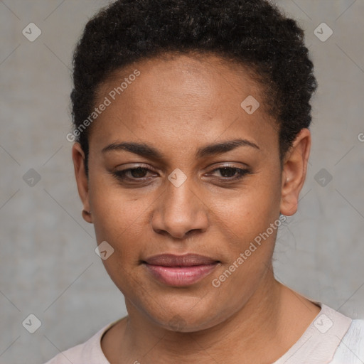 Joyful black young-adult female with short  black hair and brown eyes