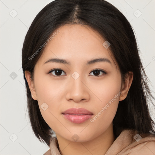 Joyful asian young-adult female with long  brown hair and brown eyes