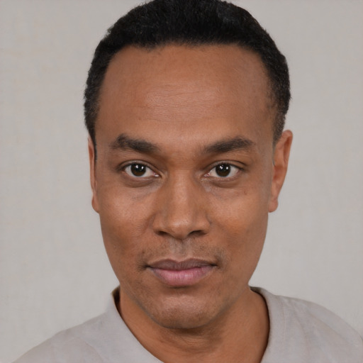 Neutral black young-adult male with short  black hair and brown eyes