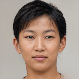 Joyful asian young-adult female with short  brown hair and brown eyes