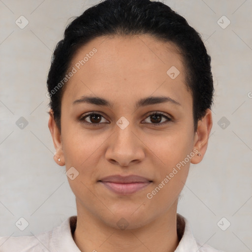 Joyful latino young-adult female with short  brown hair and brown eyes