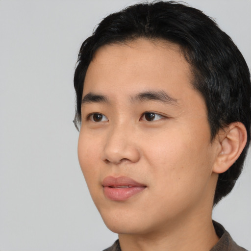 Neutral asian young-adult male with short  black hair and brown eyes