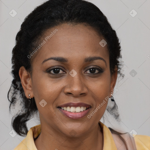 Joyful black young-adult female with medium  brown hair and brown eyes