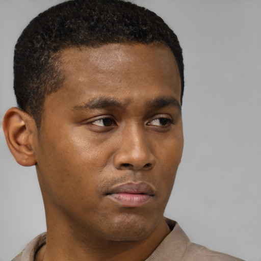 Neutral latino young-adult male with short  brown hair and brown eyes