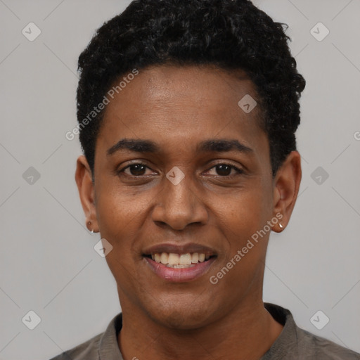 Joyful black young-adult male with short  black hair and brown eyes