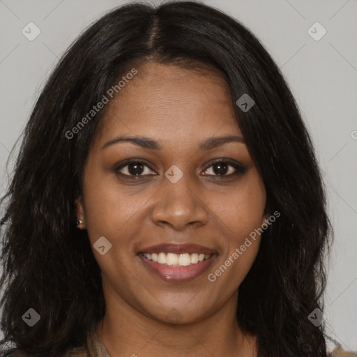 Joyful black young-adult female with long  brown hair and brown eyes