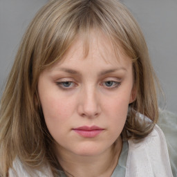 Neutral white young-adult female with medium  brown hair and grey eyes