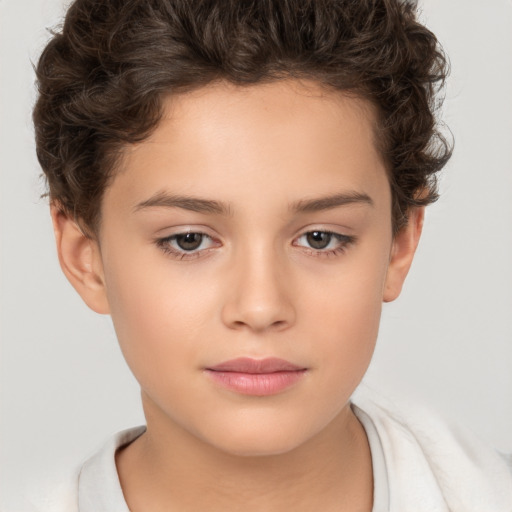 Joyful white child female with short  brown hair and brown eyes