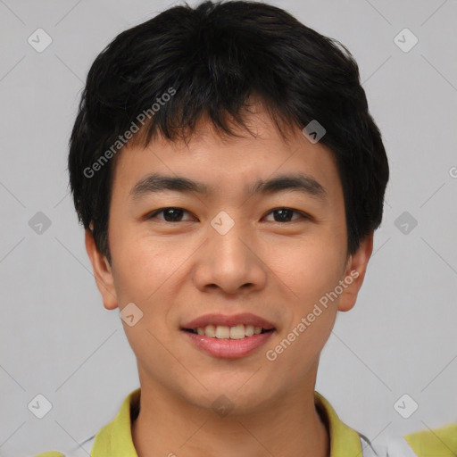 Joyful asian young-adult male with short  black hair and brown eyes