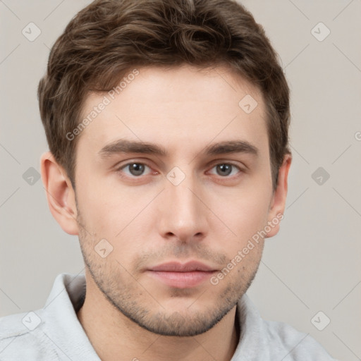 Neutral white young-adult male with short  brown hair and grey eyes