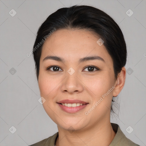 Joyful asian young-adult female with short  brown hair and brown eyes