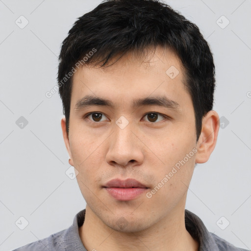 Neutral asian young-adult male with short  black hair and brown eyes