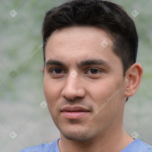 Joyful white young-adult male with short  black hair and brown eyes