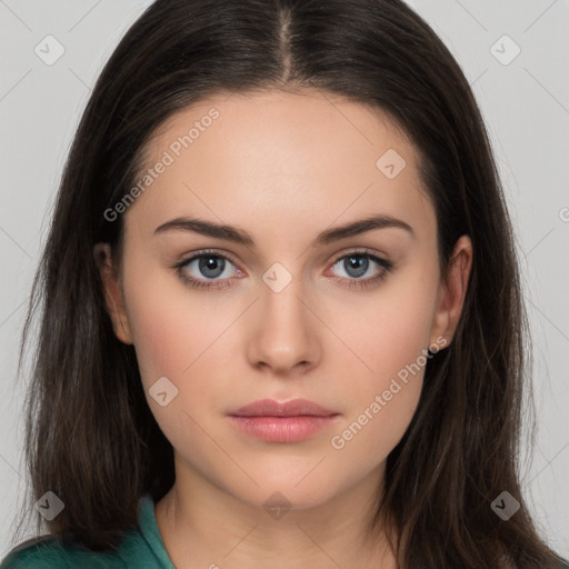 Neutral white young-adult female with long  brown hair and brown eyes