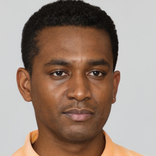 Neutral black young-adult male with short  black hair and brown eyes