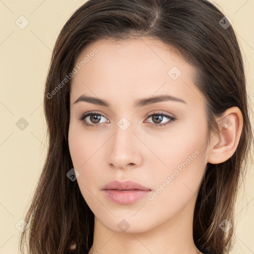 Neutral white young-adult female with long  brown hair and brown eyes