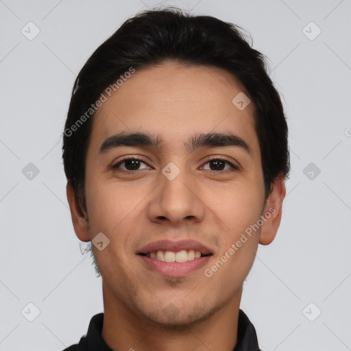 Joyful white young-adult male with short  black hair and brown eyes