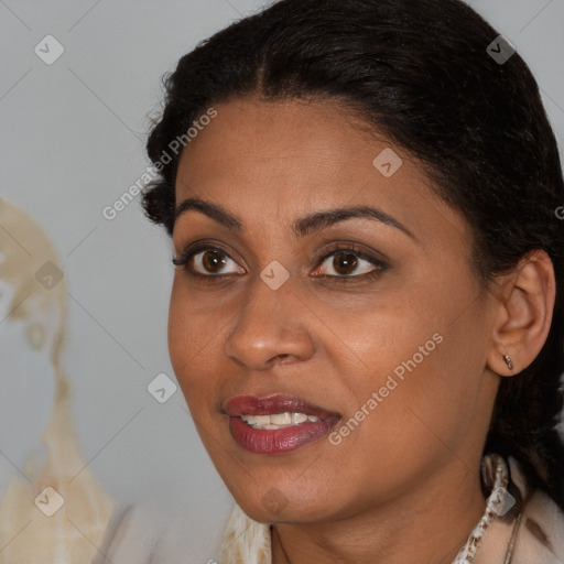 Joyful black young-adult female with medium  brown hair and brown eyes