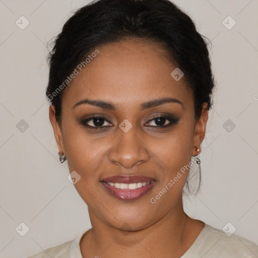 Joyful black young-adult female with short  black hair and brown eyes