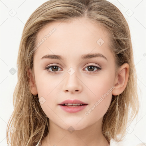 Joyful white child female with long  brown hair and brown eyes