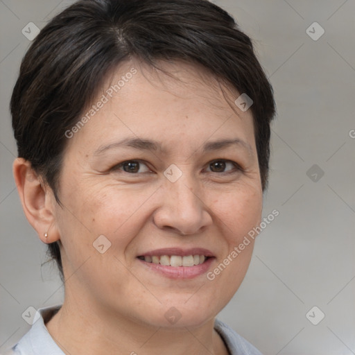 Joyful white adult female with short  brown hair and brown eyes