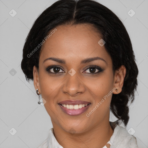 Joyful black young-adult female with medium  brown hair and brown eyes