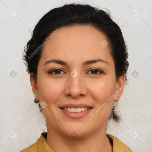 Joyful latino young-adult female with medium  brown hair and brown eyes