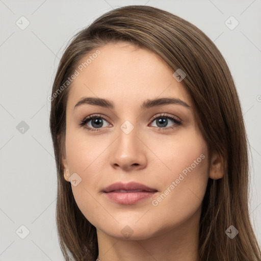 Neutral white young-adult female with long  brown hair and brown eyes