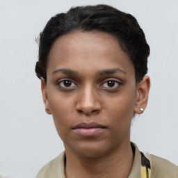 Neutral black young-adult female with short  black hair and brown eyes