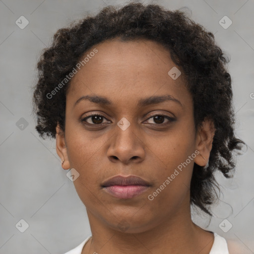 Neutral black young-adult female with short  brown hair and brown eyes