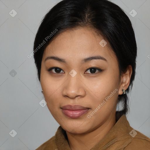 Joyful asian young-adult female with medium  black hair and brown eyes