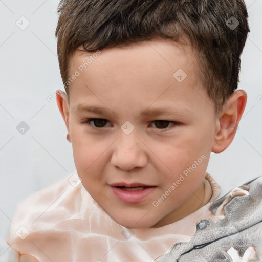 Joyful white child male with short  brown hair and brown eyes