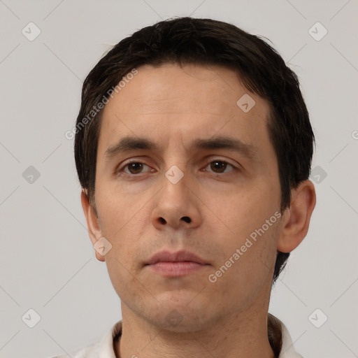 Neutral white adult male with short  brown hair and brown eyes