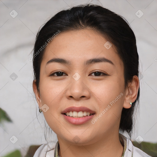 Joyful asian young-adult female with medium  brown hair and brown eyes