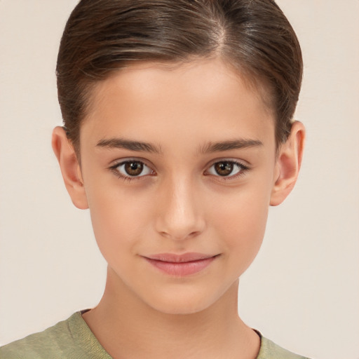 Joyful white child female with short  brown hair and brown eyes