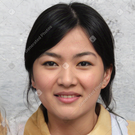 Joyful asian young-adult female with medium  black hair and brown eyes