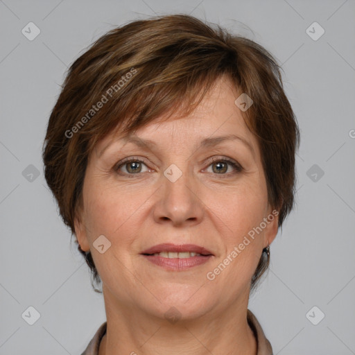 Joyful white adult female with medium  brown hair and grey eyes