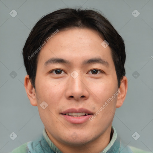 Joyful asian young-adult male with short  brown hair and brown eyes