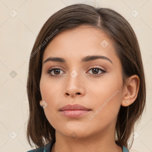 Neutral white young-adult female with medium  brown hair and brown eyes